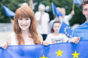 Woman with European Union flag and rights - Emigrate2
