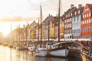 Colorful houses in Copenhagen old town at sunset - Emigrate2
